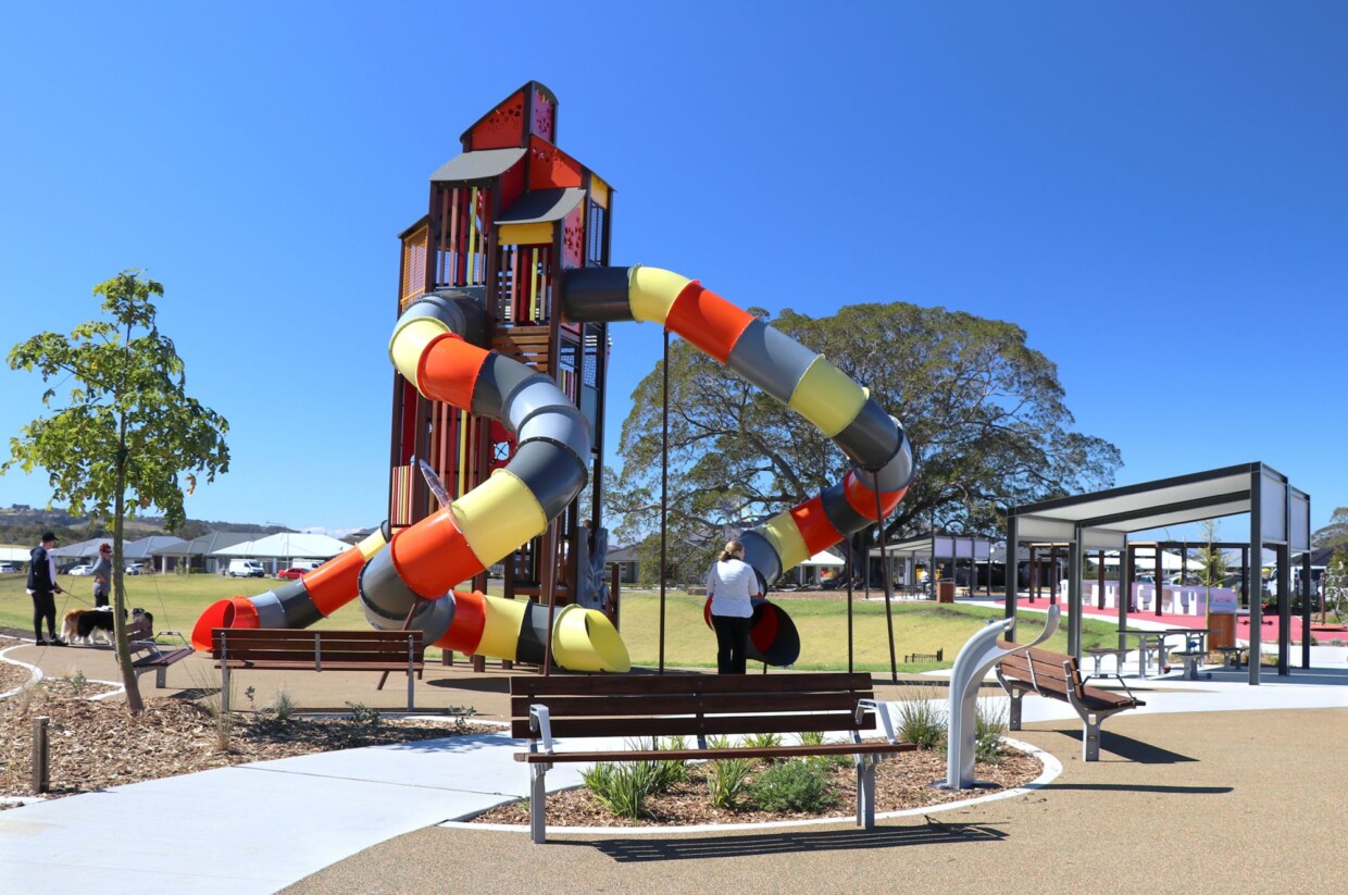 moduplay_bankbook-park public playground_belltower with slide tubes